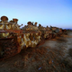 Illustration for article titled Gloomy tank graveyards hold the rusting bones of war